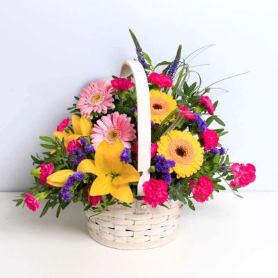 The Arcadia Basket is a colourful combination of seasonal, hand tied flowers arranged by an expert local florist. Brighten up someone's day with this classic basket design. This bouquet will be handcrafted by an experienced florist, and delivered by hand.