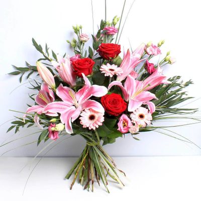 The ideal handcrafted bouquet to express your love, this colourful combination of Germini, Lily, Lisianthus and Roses are fantastic Valentine's flowers. Show your feelings with our hand tied flowers. This bouquet will be handcrafted by an experienced florist, order for same day delivery by hand, or next day delivery via our courier.